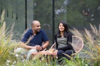 The designer and owner Vishal and his wife Meera relaxing in their garden. 