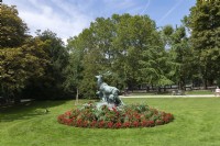 Paris France
Jardin du Luxembourg 
Statue of a stag and deer with red border made up of dahlias marigold, salvia and begonias