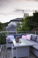 Garden furniture on a terrace in July