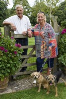 Ann and John Thompson-Ashby with their border terriers Tiggy and Tod