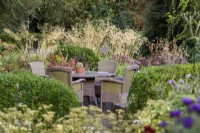Seating area in a country garden in September