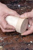 Making biodegradable plant pots with old newspaper