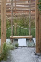 Wooden swing in 'Across the Board' garden, a solution for a new-build garden, BBC Gardener's World Live 2018