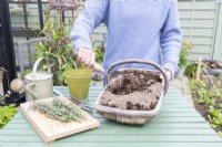 Woman mixing grit and compost