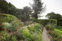 Herbaceous border and gravel garden.