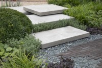 'Shades of Grey' at BBC Gardener's World Live 2021 - urban contemporary garden using different grey hard landscaping materials, August
