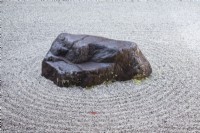 Placed rock in raked gravel known as karesansui which translates as 