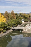 View from the Keep Tower of the Honmaru garden over the moat and bridge to the city beyond.
