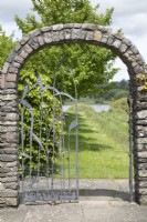 Decorative wrought iron gate at Yeo Valley Organic Garden, May