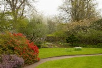 Azalea, Erica, Prunus and a rock garden at Cawdor Castle Gardens.