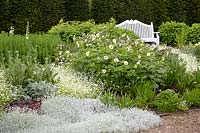 White garden with seating area 