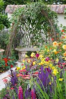 Colorful garden with arbor 