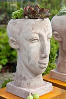 Head sculpture as planter 