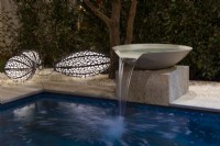 Lighting in evening by the pool. Water bowl feature and brass floor lamps inspired by nature. Hedge of Elaeagnus ebbingei 
Designer: Vetschpartner, Berger Gartenbau and Livingdreams. Giardina-Zurich, Swiss. 


 
