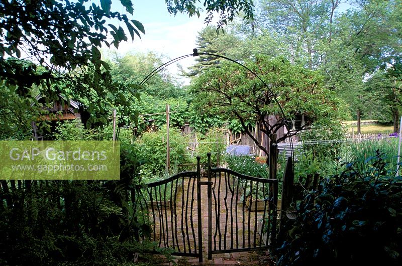 Gate with arch at entrance to The Simpsons Garden in Connecticut US