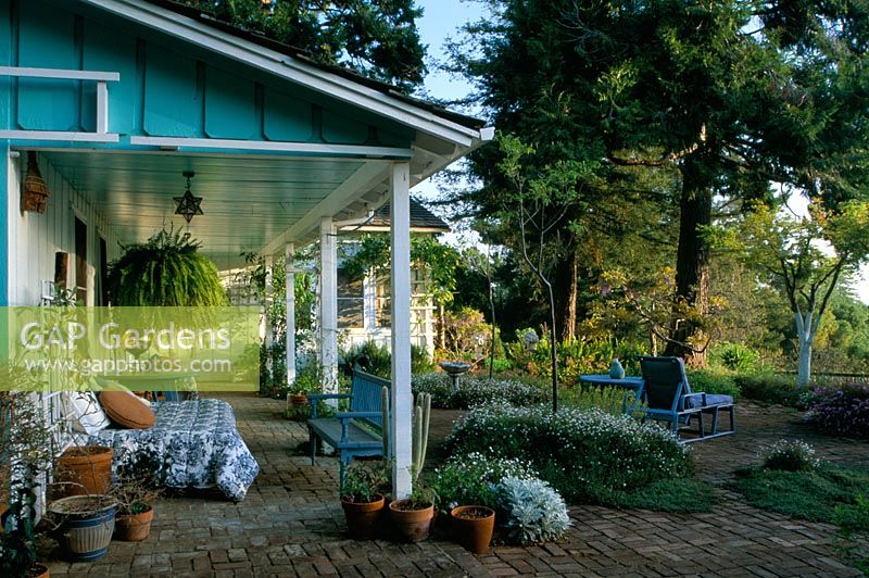 Verandah and patio with funrniture and containers. Los Gatos in California US