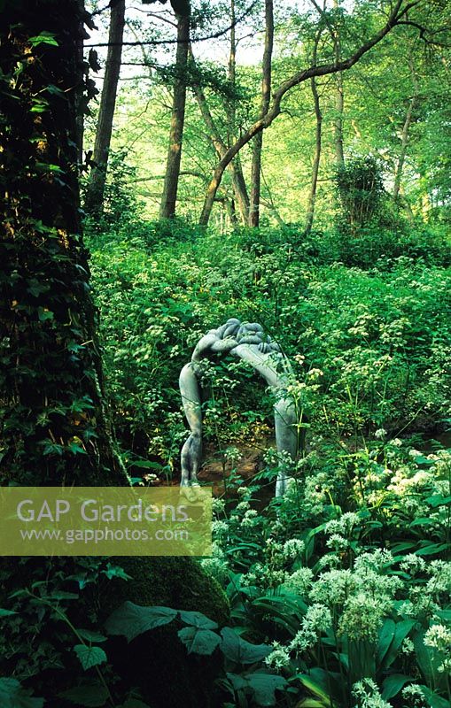 Gardens of Gaia, Kent. The Kissing Arch sculpture by Paul Riley. 