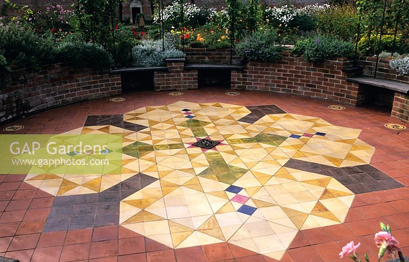 Sacred garden. Central patio area with mandala mosaic floor
