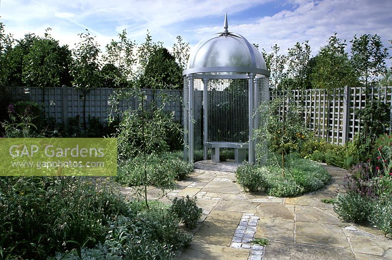 Romantic silver patio garden with gazebo, trellis