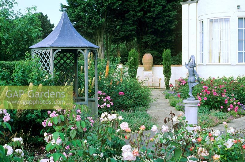 Gazebo in formal rose garden with Statue at Kettle Hill, Norfolk