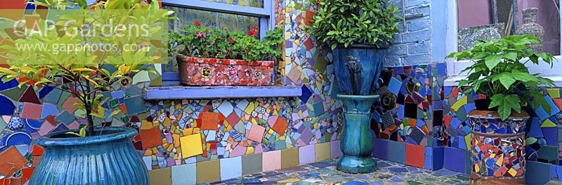 Planters in mosaic garden, London


