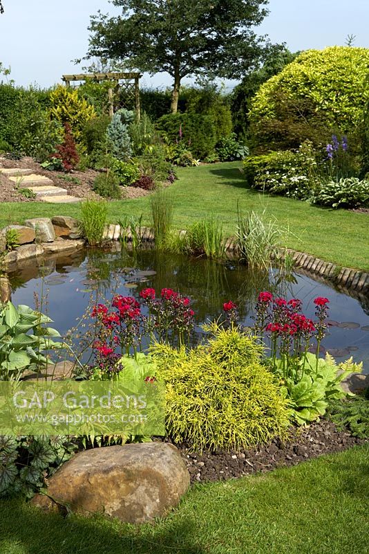 Well planted garden pond at Cypress House in Dalton