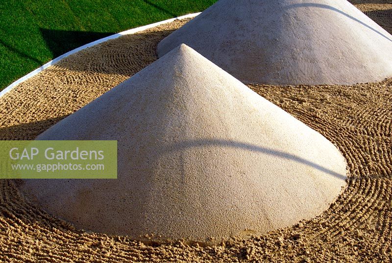 Sand cone sculpture in the 'LandArt' garden at the RHS Hampton Court Flower Show
