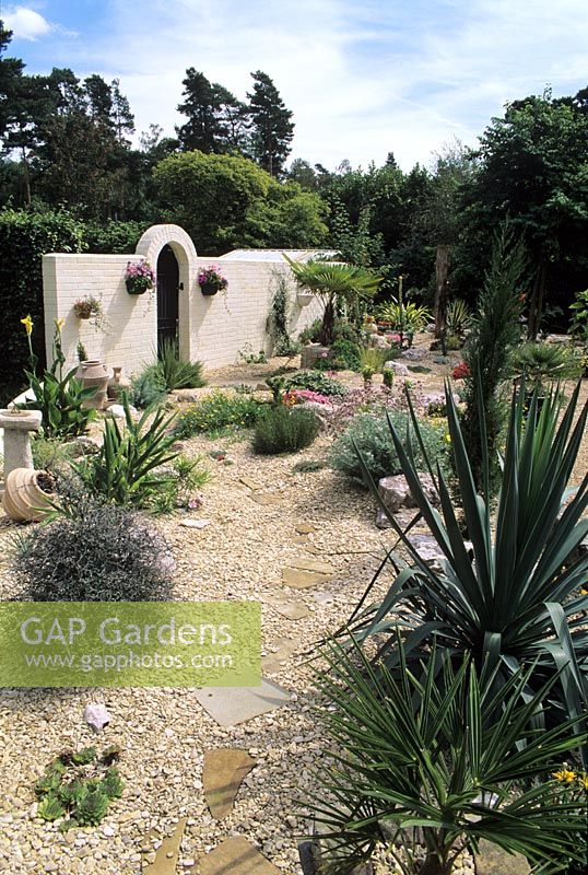 Gravel garden with mediterranean style planting -  White Knights, Buckinghamshire