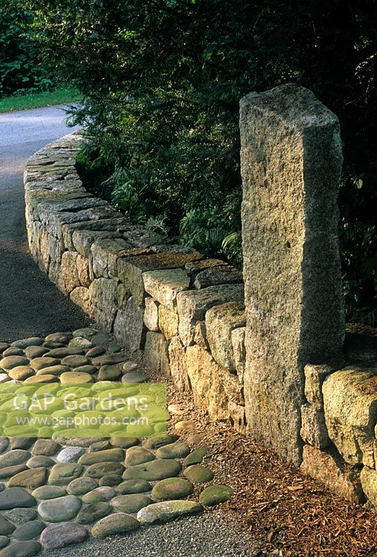 Close up detail of dry stone wall and pebble paving - Gansett House, Woody Hole, Massachusetts