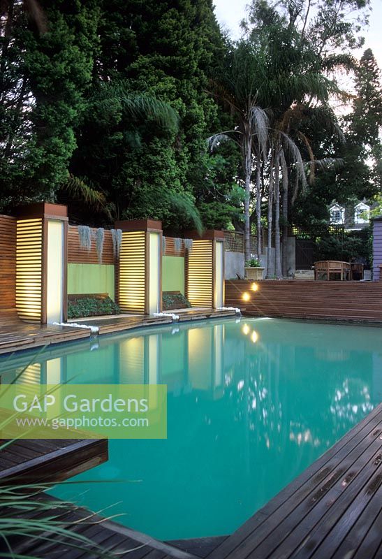 Contemporary pool area of garden with raised shady seating area - Hunters Hill, Sydney, NSW   