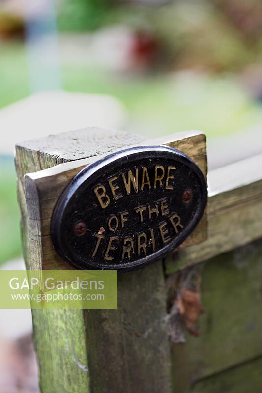 'Beware of the Terrier' garden signpost
