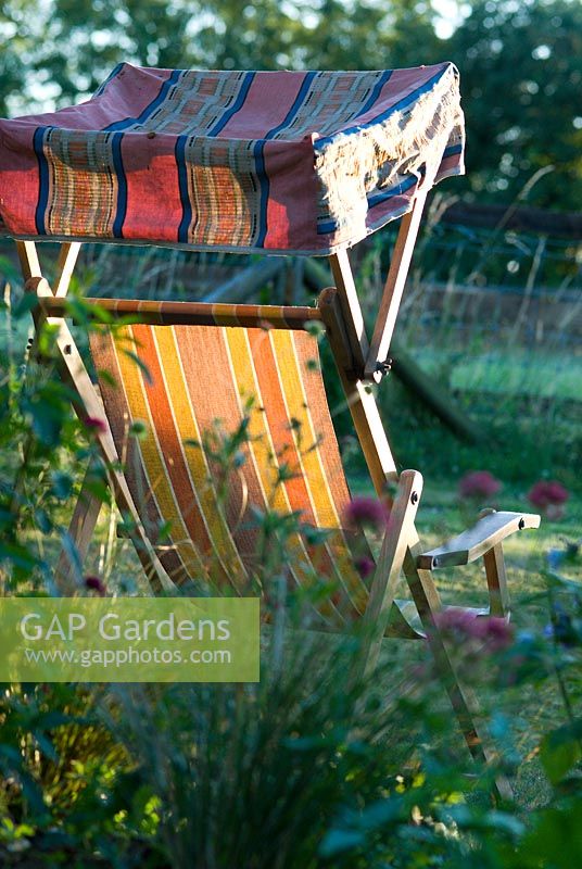 Stripey deckchair in sunlight
