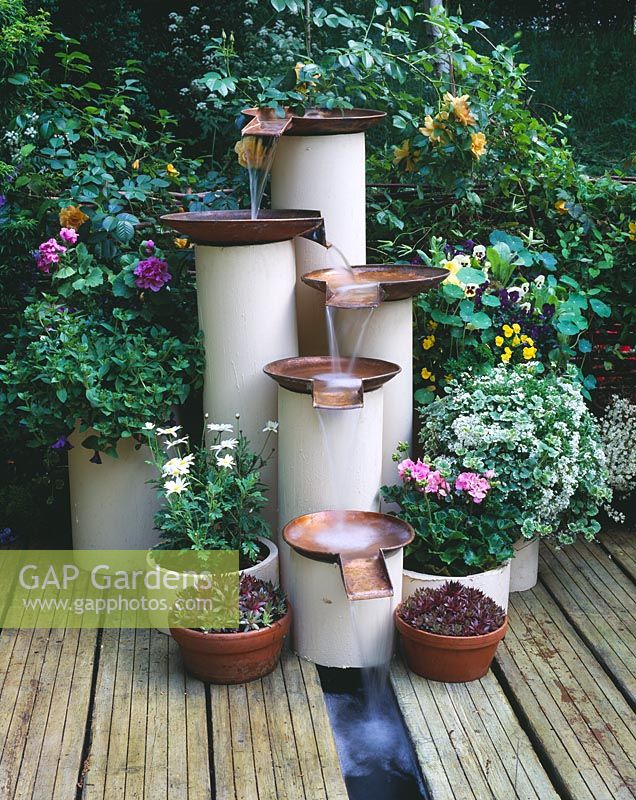 Water feature made from recycled hot water cylinders and gas mains