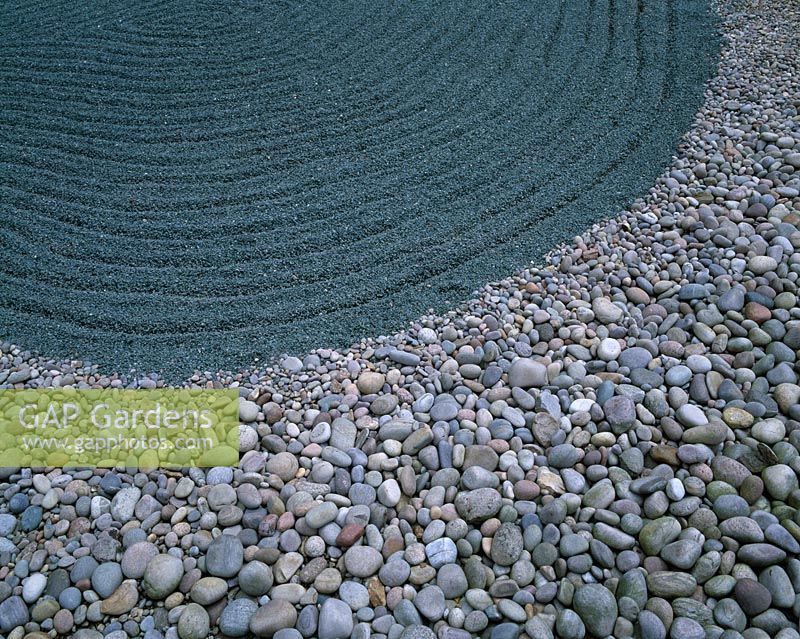 Cobbles and raked gravel in The Water Gardens - London - 'The Swimmer', a Japanese inspired landscape by Tony Heywood
