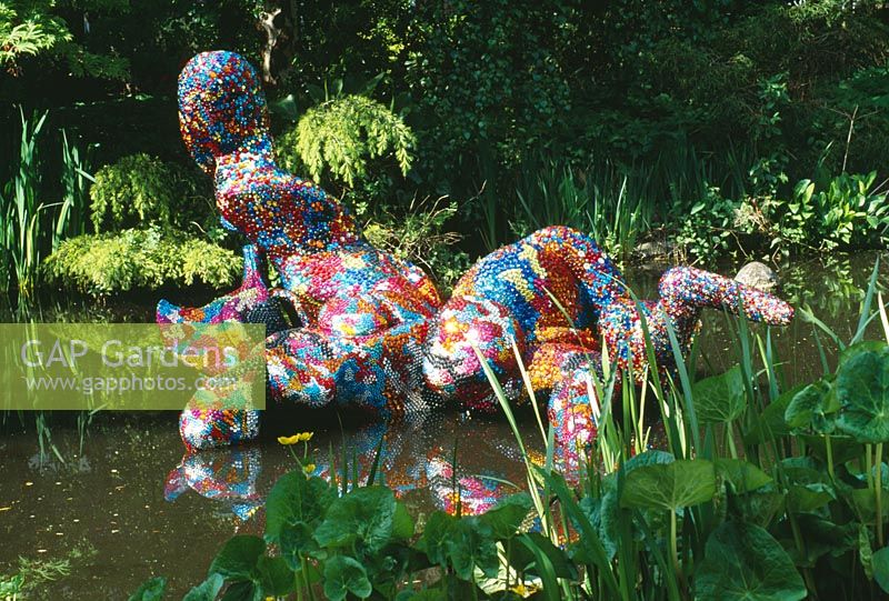 Sculpture in water called 'Are all Things Bright and Beautiful' made from coloured beads