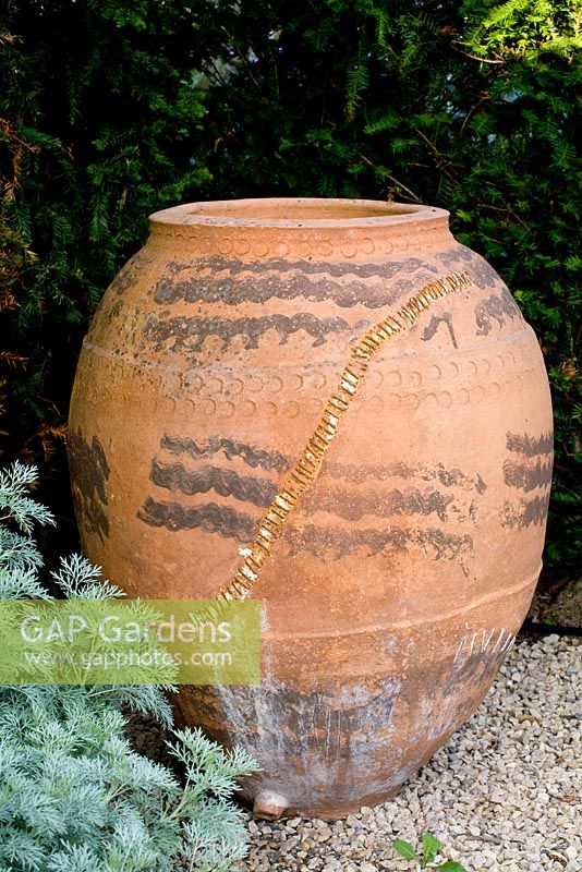 Decorative pot beside Artemisia 