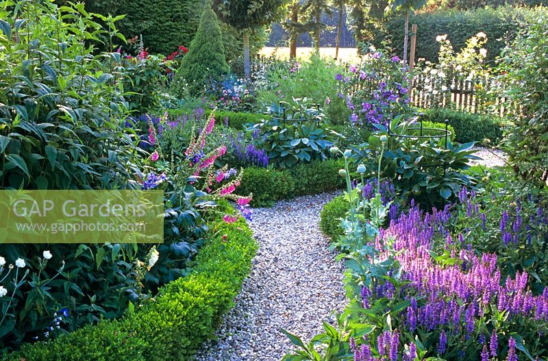Cottage style garden with gravel path