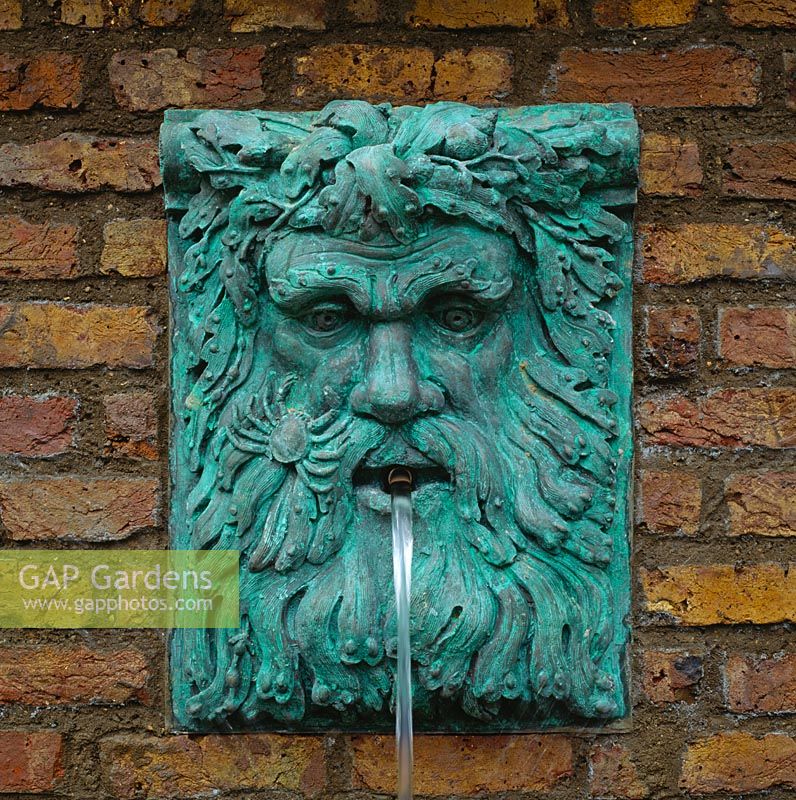 Water feature - Classical head of neptune water spout painted verdigris and designed by Anthony Noel