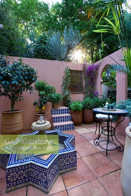 Moroccan style mediterranean courtyard with tiled fountain in the Garden - SPANA's Courtyard Refuge, Design - Chris O'Donoghue, Sponsor - Society for the Protection of Animals Abroad, RHS Chelsea Flower Show 2008