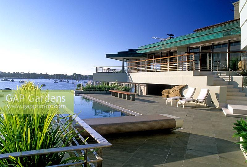 Coastal terrace with seating areas and raised levels - Australia