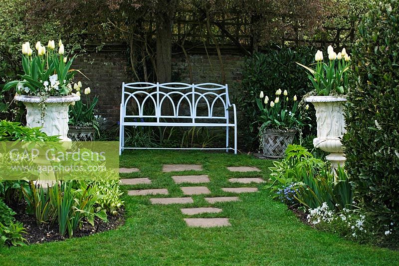 Secluded seating area in the 'White Garden' - Chenies Manor Gardens