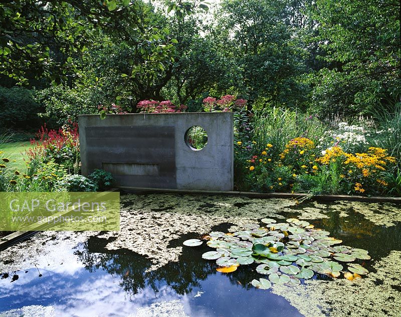 Concrete sculpture over lily pond - Greystone Cottage, Oxfordshire