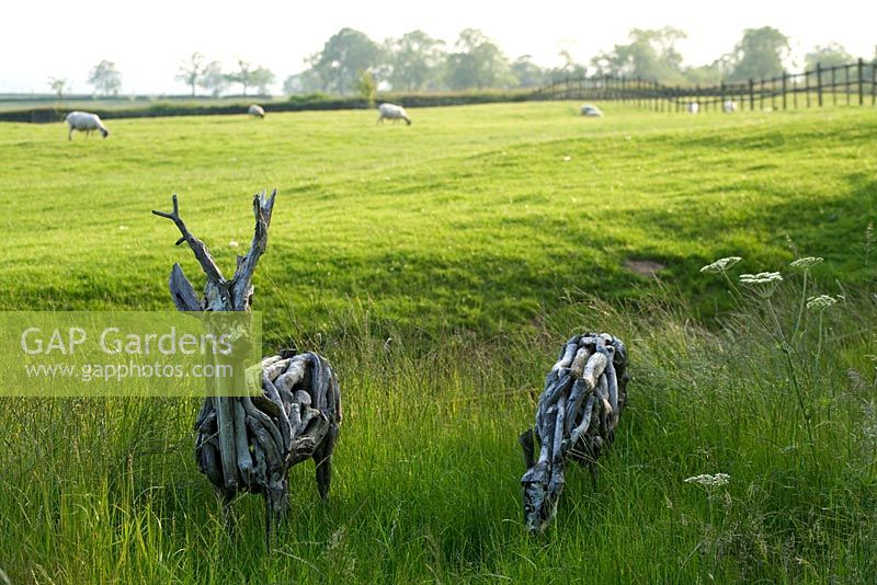 Deer sculptures made from natural wood - The Old Rectory, Haselbech, Northamptonshire