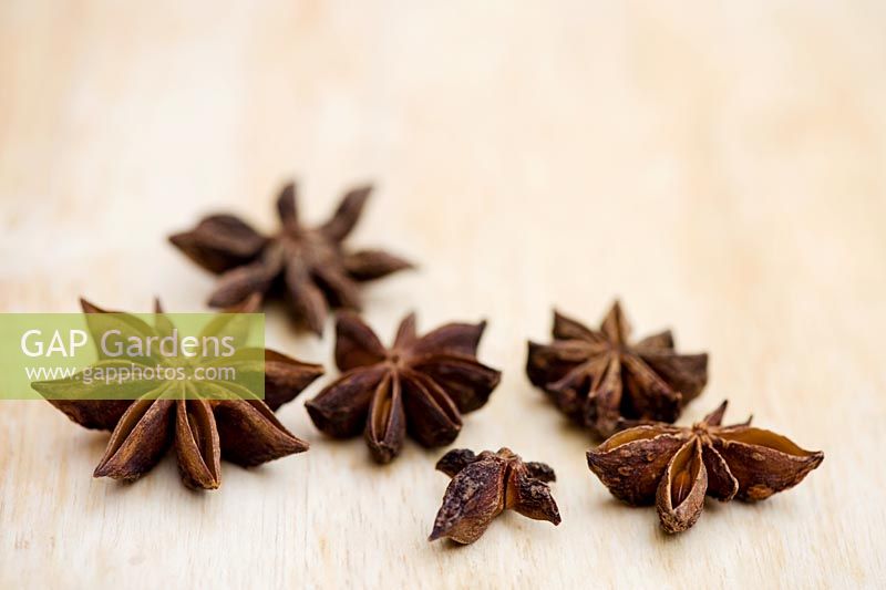 Star Anise on wooden chopping board