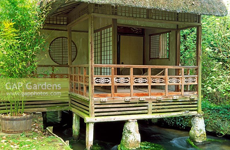 Japanese tea house straddling water channel - Heale Garden, nr Salisbury, Wiltshire 