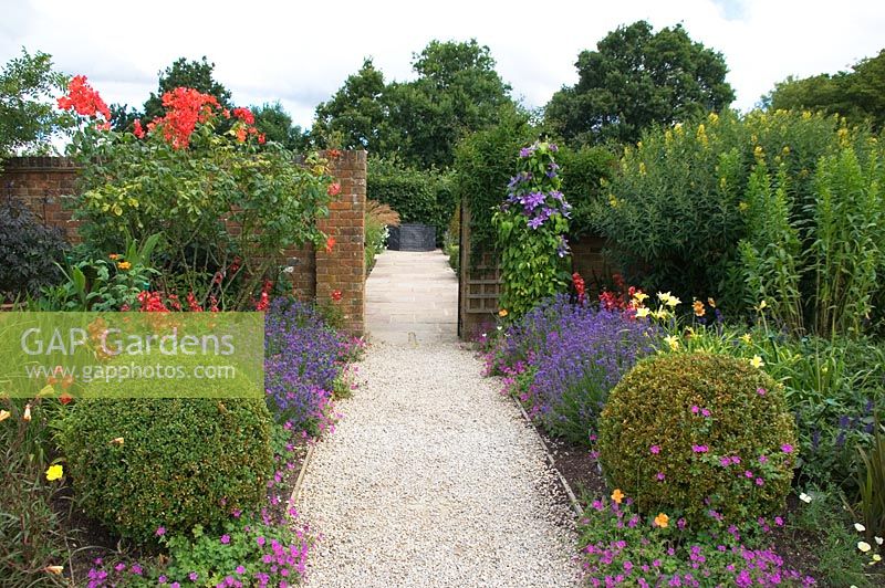 Garden gate and path at Merriments Gardens, Sussex