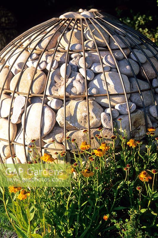 Stone filled circular steel gabion at RHS Hampton Court Flower Show