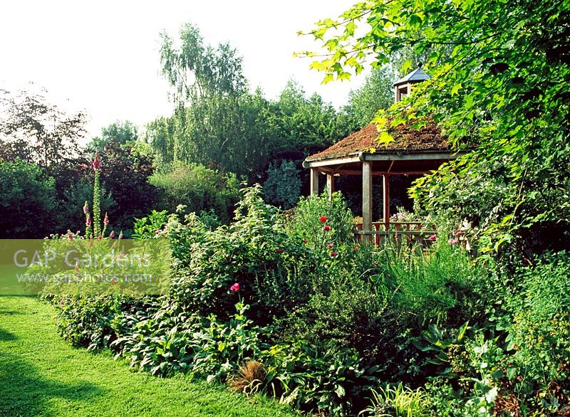 Mixed summer border with gazebo behind - Lower Severalls