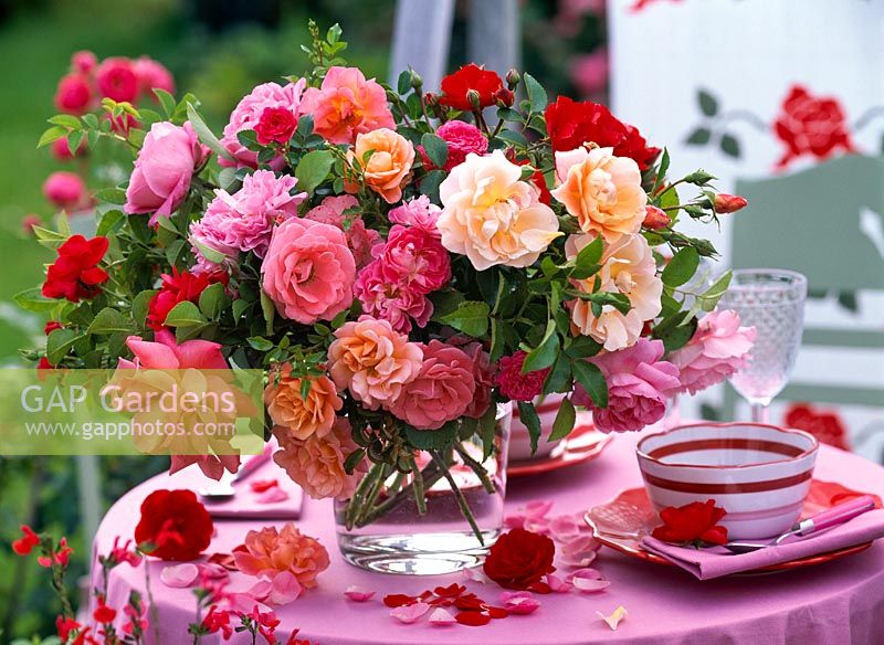 Floral display of mixed roses on tabletop