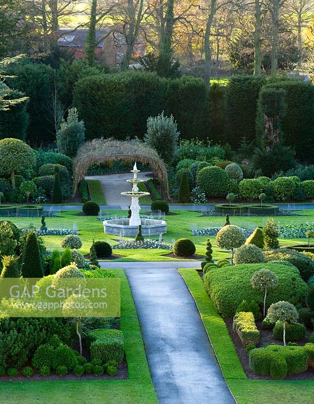 View of lawn and evergreen topiary borders from the roof of the hall - Brodsworth Hall, Yorkshire